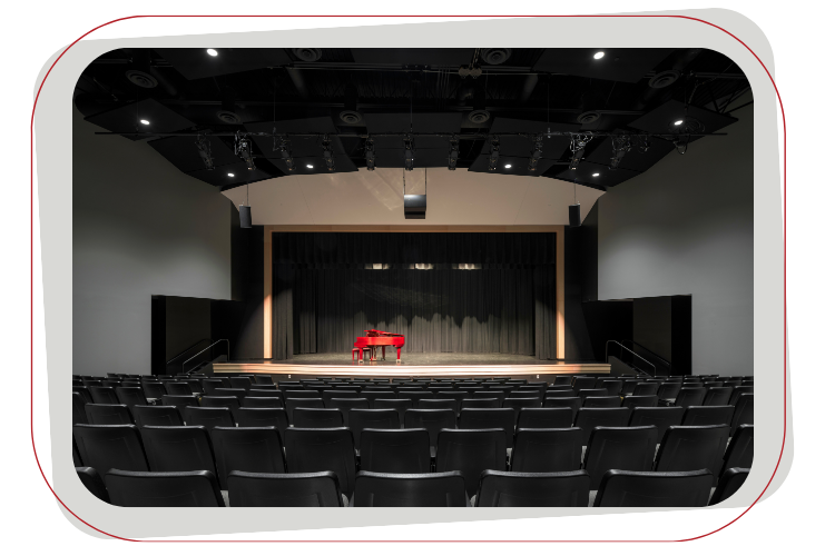 auditorium with red piano